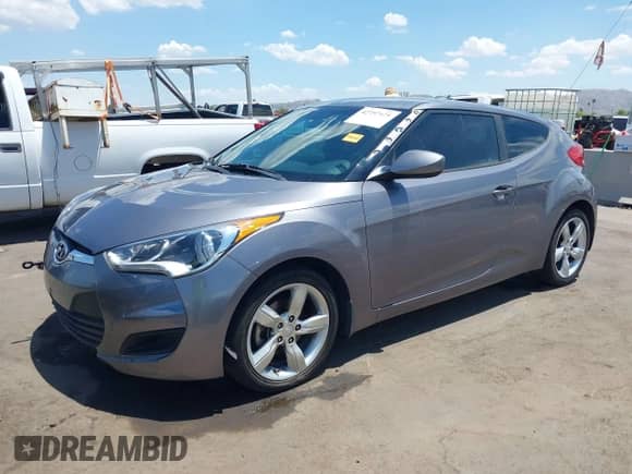 2015 Hyundai Veloster with VIN KMHTC6AD6FU239445, listed as a IAAI auction lot 42757675 with 114,509 mi miles and . Bid and sale history available at DreamBid. Image 2.