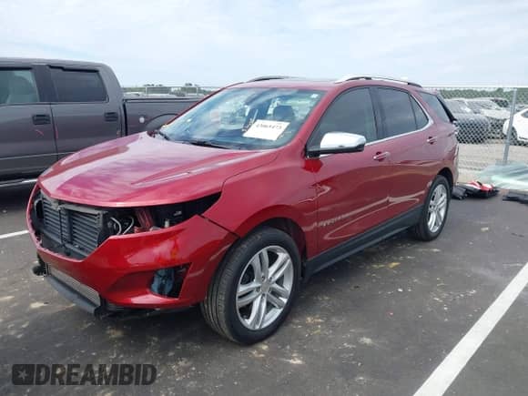2020 Chevrolet Equinox Premier with VIN 3GNAXYEX7LS559957, listed as a IAAI auction lot 43065473 with 64,431 mi miles and . Bid and sale history available at DreamBid. Image 2.
