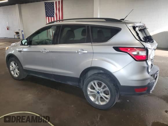 2017 Ford Escape SE z VIN 1FMCU9G91HUE87820, wystawiony jako Copart lot #80785325 z przebiegiem 118 426 mil mil oraz Szkoda całkowita • Salvage title. Historia ofert i sprzedaży dostępna na DreamBid. Obrazek 2.