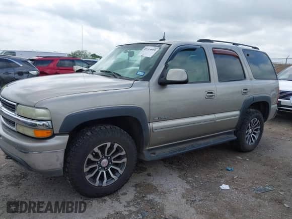 2003 Chevrolet Tahoe Z71 with VIN 1GNEK13Z23R204662, listed as a IAAI auction lot 42113010 with 209,429 mi miles and . Bid and sale history available at DreamBid. Image 2.