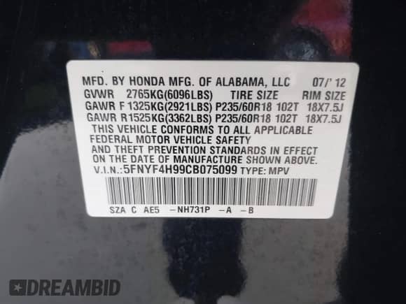 2012 Honda Pilot Touring with VIN 5FNYF4H99CB075099, listed as a IAAI auction lot 42674383 with 203,684 mi miles and . Bid and sale history available at DreamBid. Image 9.