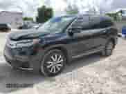 2022 Honda Pilot Touring 7-Passenger with VIN 5FNYF5H60NB034388, listed as a Copart auction lot 65687615 with 49,231 mi miles and Salvage title. Bid and sale history available at DreamBid. Image 1.