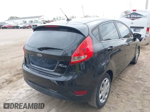 2011 Ford Fiesta SE with VIN 3FADP4EJ5BM159706, listed as a IAAI auction lot 43435650 with 161,895 mi miles and . Bid and sale history available at DreamBid. Image 4.