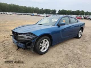 2021 Dodge Charger SXT с VIN 2C3CDXBG2MH628247, выставлен на аукционе Copart как лот 70930105 с пробегом 103 861 миль миль и Списание • Salvage title. История ставок и продаж доступна на DreamBid. Изображение 1.