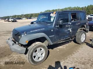2007 Jeep Wrangler Unlimited Rubicon с VIN 1J4GA69167L154709, выставлен на аукционе Copart как лот 87370255 с пробегом 151 871 миль миль и Списание • Salvage title. История ставок и продаж доступна на DreamBid. Изображение 1.