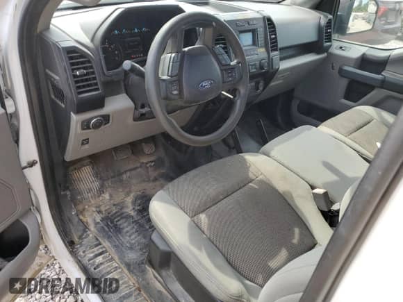 2019 Ford F-150 XL with VIN 1FTNF1C40KKD89058, listed as a Copart auction lot 63053485 with 233,103 mi miles and Salvage title. Bid and sale history available at DreamBid. Image 8.