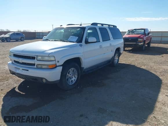 2005 Chevrolet Suburban LT z VIN 3GNEC16Z95G288863, wystawiony jako IAAI lot #41653675 z przebiegiem 309 977 mil mil oraz . Historia ofert i sprzedaży dostępna na DreamBid. Obrazek 17.