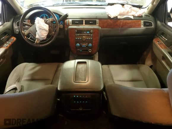 2012 Chevrolet Tahoe LS with VIN 1GNSKAE06CR227928, listed as a Copart auction lot 65878915 with 117,985 mi miles and Salvage title. Bid and sale history available at DreamBid. Image 8.