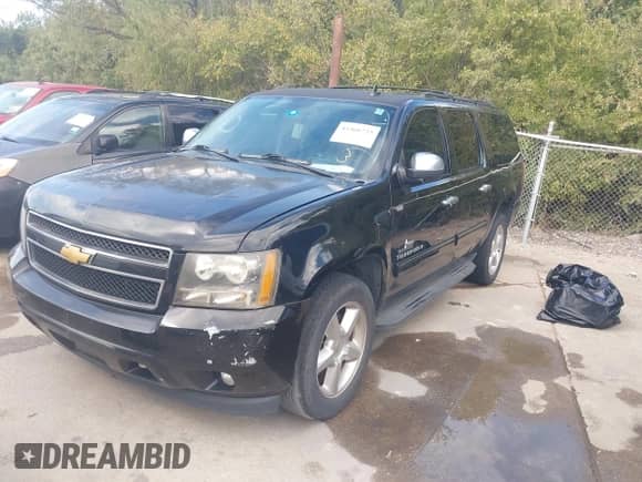 2013 Chevrolet Suburban LT with VIN 1GNSCJE00DR337906, listed as a IAAI auction lot 43466723 with 167,524 mi miles and . Bid and sale history available at DreamBid. Image 2.