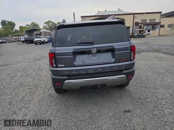 2026 Honda Passport с VIN 5FNYF9H51TB010726, выставлен на аукционе Copart как лот 90671675 с пробегом 2 413 миль миль и Списание • Salvage title. История ставок и продаж доступна на DreamBid. Изображение 6.