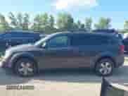 2014 Dodge Journey SE with VIN 3C4PDDAG5ET279249, listed as a IAAI auction lot 43113809 with 205,829 mi miles and . Bid and sale history available at DreamBid. Image 14.