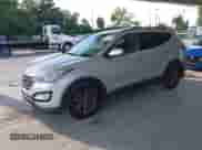 2014 Hyundai Santa Fe z VIN 5XYZU3LB3EG206926, wystawiony jako IAAI lot #43301222 z przebiegiem 134 184 mil mil oraz . Historia ofert i sprzedaży dostępna na DreamBid. Obrazek 17.