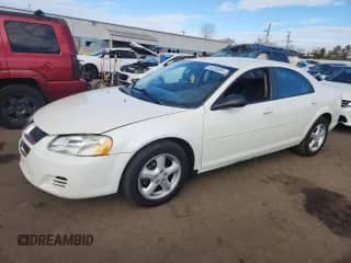 2006 Dodge Stratus SXT with VIN 1B3EL46XX6N197040, listed as a Copart auction lot 87235055 with 90,828 mi miles and Salvage title. Bid and sale history available at DreamBid. Image 1.