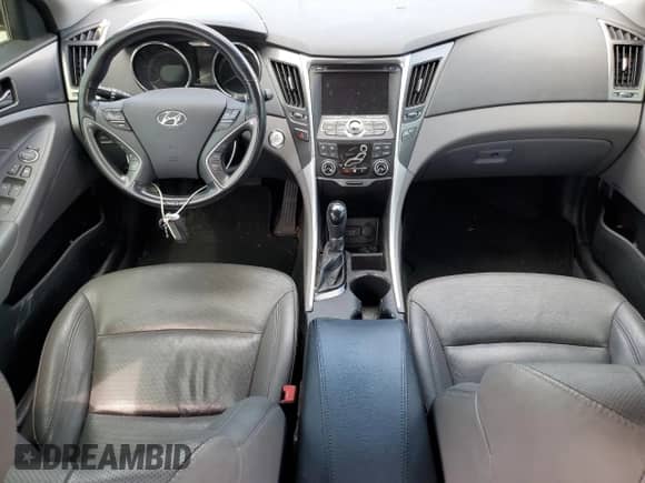 2013 Hyundai Sonata Limited с VIN KMHEC4A41DA050696, выставлен на аукционе Copart как лот 65444075 с пробегом Не указан миль и Списание • Salvage title. История ставок и продаж доступна на DreamBid. Изображение 8.