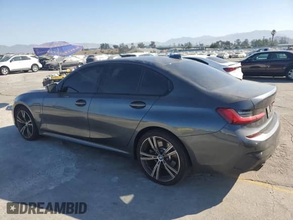 2021 BMW 3 Series 330e xDrive z VIN WBA5P9C00MFJ80209, wystawiony jako Copart lot #66223955 z przebiegiem 131 238 mil mil oraz Szkoda całkowita • Salvage title. Historia ofert i sprzedaży dostępna na DreamBid. Obrazek 2.