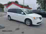 2014 Dodge Grand Caravan SXT 30th Anniversary with VIN 2C4RDGCG0ER254057, listed as a IAAI auction lot 40737960 with 142,301 mi miles and . Bid and sale history available at DreamBid. Image 1.