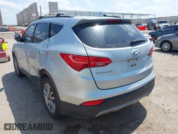 2016 Hyundai Santa Fe with VIN 5XYZU3LA2GG325786, listed as a IAAI auction lot 42515766 with 214,896 mi miles and . Bid and sale history available at DreamBid. Image 3.