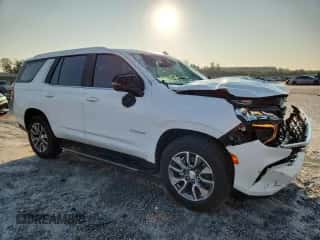 2023 Chevrolet Tahoe LT z VIN 1GNSKNKTXPR490239, wystawiony jako Copart lot #68915225 z przebiegiem 19 862 mil mil oraz Szkoda całkowita • Salvage title. Historia ofert i sprzedaży dostępna na DreamBid. Obrazek 4.