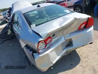 2012 Chevrolet Malibu 1LS z VIN 1G1ZB5E08CF299030, wystawiony jako IAAI lot #42933449 z przebiegiem 106 065 mil mil oraz . Historia ofert i sprzedaży dostępna na DreamBid. Obrazek 6.