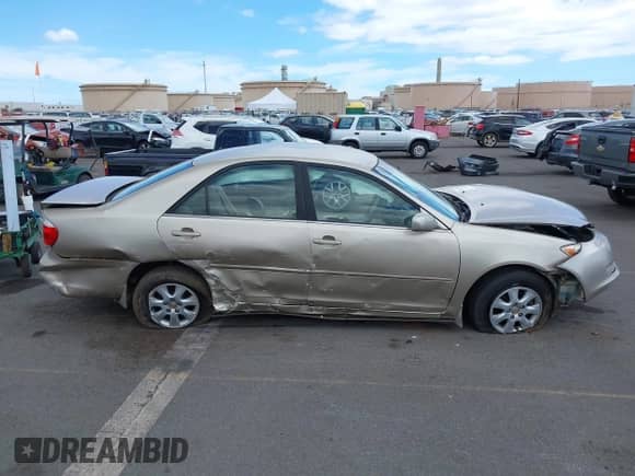 2005 Toyota Camry LE with VIN JTDBF30K150158395, listed as a IAAI auction lot 42998789 with Not provided miles and . Bid and sale history available at DreamBid. Image 13.