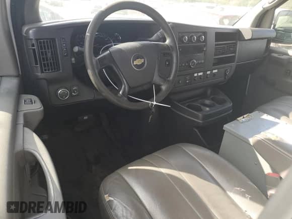 2013 Chevrolet Express Cargo с VIN 1GCWGFCA1D1191828, выставлен на аукционе Copart как лот 68979255 с пробегом 150 615 миль миль и Чистый • Clean title. История ставок и продаж доступна на DreamBid. Изображение 8.