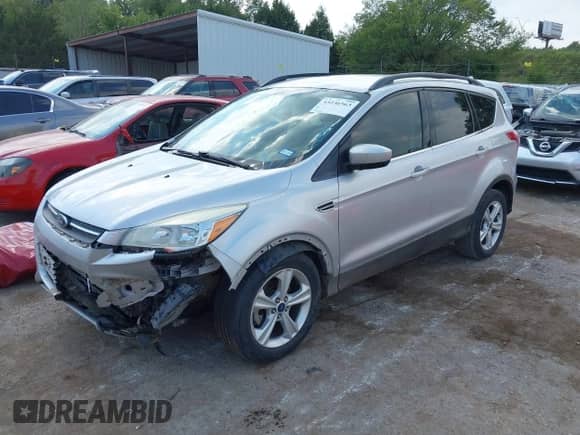 2014 Ford Escape SE with VIN 1FMCU0GX0EUB15147, listed as a IAAI auction lot 43236563 with 140,191 mi miles and . Bid and sale history available at DreamBid. Image 2.