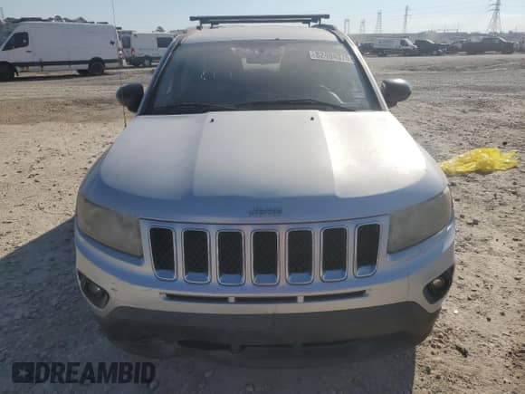 2012 Jeep Compass Sport с VIN 1C4NJCBA7CD550612, выставлен на аукционе Copart как лот 82494375 с пробегом 183 730 миль миль и Списание • Salvage title. История ставок и продаж доступна на DreamBid. Изображение 5.