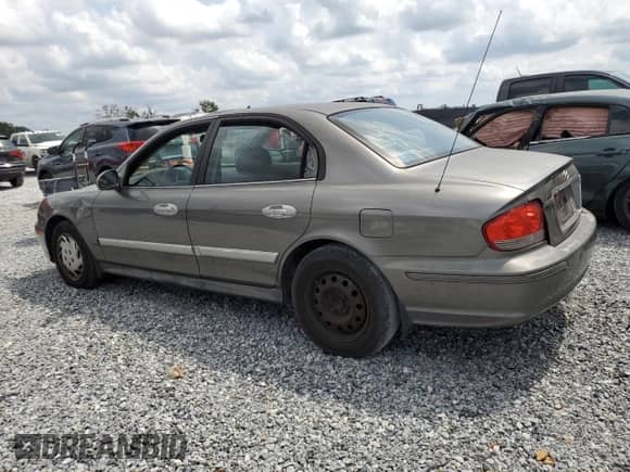 2004 Hyundai Sonata with VIN KMHWF25HX4A957069, listed as a Copart auction lot 56349275 with 184,083 mi miles and Salvage title. Bid and sale history available at DreamBid. Image 2.