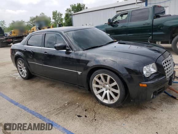 2006 Chrysler 300 C SRT-8 z VIN 2C3LA73W76H102777, wystawiony jako Copart lot #60065925 z przebiegiem 97 765 mil mil oraz Szkoda całkowita • Salvage title. Historia ofert i sprzedaży dostępna na DreamBid. Obrazek 4.