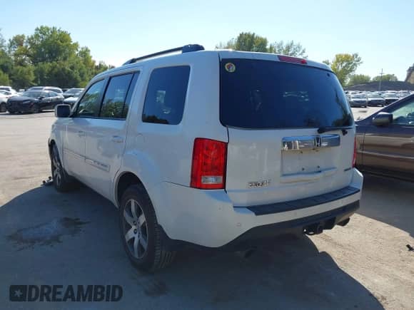 2012 Honda Pilot Touring with VIN 5FNYF3H90CB024228, listed as a IAAI auction lot 43395780 with 276,515 mi miles and . Bid and sale history available at DreamBid. Image 3.