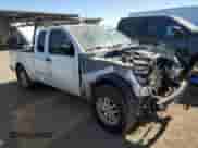 2015 Nissan Frontier SV with VIN 1N6AD0CW7FN736757, listed as a Copart auction lot 74289654 with 142,194 mi miles and Salvage title. Bid and sale history available at DreamBid. Image 4.