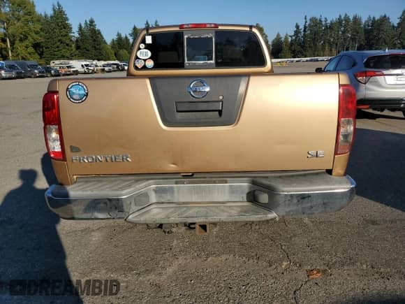 2005 Nissan Frontier SE z VIN 1N6AD06W95C403370, wystawiony jako Copart lot #82293115 z przebiegiem 263 899 mil mil oraz Szkoda całkowita • Salvage title. Historia ofert i sprzedaży dostępna na DreamBid. Obrazek 6.