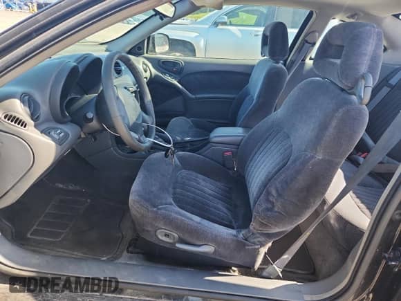 1999 Pontiac Grand Am GT z VIN 1G2NW12EXXM869943, wystawiony jako Copart lot #65240175 z przebiegiem 148 984 mil mil oraz Nie do naprawy • Non repairable. Historia ofert i sprzedaży dostępna na DreamBid. Obrazek 7.