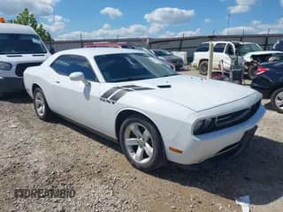 2013 Dodge Challenger SXT с VIN 2C3CDYAG2DH724015, выставлен на аукционе IAAI как лот 43314298 с пробегом 167 454 миль миль и . История ставок и продаж доступна на DreamBid. Изображение 1.
