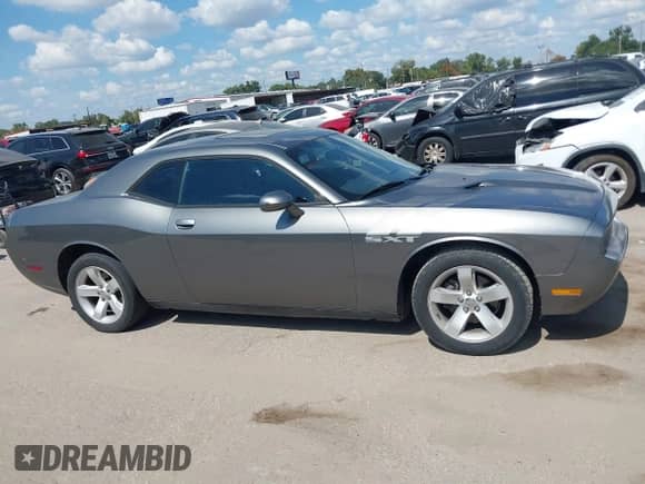 2011 Dodge Challenger z VIN 2B3CJ4DG5BH603714, wystawiony jako IAAI lot #43386407 z przebiegiem 184 050 mil mil oraz . Historia ofert i sprzedaży dostępna na DreamBid. Obrazek 13.