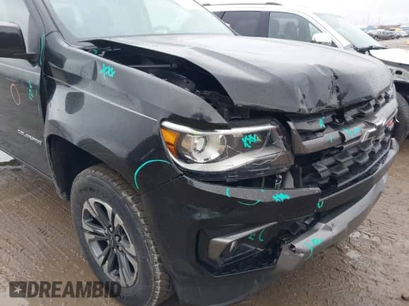 2021 Chevrolet Colorado 4WD Z71 z VIN 1GCGTDEN7M1282445, wystawiony jako IAAI lot #41737419 z przebiegiem 27 187 mil mil oraz . Historia ofert i sprzedaży dostępna na DreamBid. Obrazek 6.