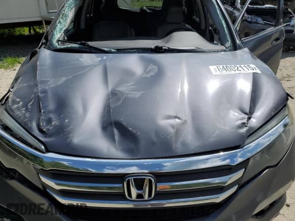 2017 Honda Pilot EX z VIN 5FNYF6H3XHB095358, wystawiony jako Copart lot #64002115 z przebiegiem 148 495 mil mil oraz Szkoda całkowita • Salvage title. Historia ofert i sprzedaży dostępna na DreamBid. Obrazek 12.