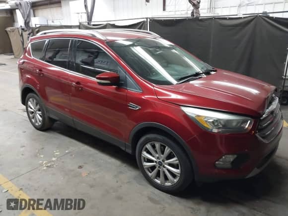 2017 Ford Escape Titanium with VIN 1FMCU0J95HUC51210, listed as a IAAI auction lot 43185339 with 82,388 mi miles and . Bid and sale history available at DreamBid. Image 13.