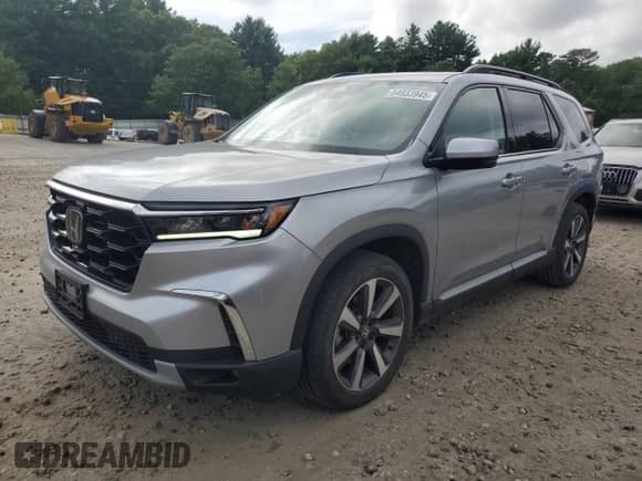 2023 Honda Pilot Touring z VIN 5FNYG1H78PB012799, wystawiony jako Copart lot #64933945 z przebiegiem 31 834 mil mil oraz Szkoda całkowita • Salvage title. Historia ofert i sprzedaży dostępna na DreamBid. Obrazek 1.