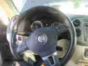 2011 Volkswagen Tiguan SE with VIN WVGAV7AX5BW512469, listed as a IAAI auction lot 42673142 with 165,159 mi miles and . Bid and sale history available at DreamBid. Image 6.