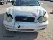 2002 Hyundai Sonata GLS z VIN KMHWF35HX2A552641, wystawiony jako Copart lot #57324655 z przebiegiem 274 808 mil mil oraz Szkoda całkowita • Salvage title. Historia ofert i sprzedaży dostępna na DreamBid. Obrazek 11.
