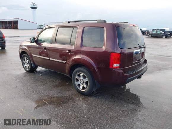 2009 Honda Pilot Touring with VIN 5FNYF38819B022195, listed as a IAAI auction lot 42850497 with 192,072 mi miles and . Bid and sale history available at DreamBid. Image 3.