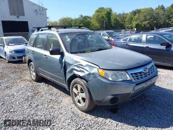 2013 Subaru Forester X z VIN JF2SHABC2DH409110, wystawiony jako IAAI lot #43334890 z przebiegiem 204 069 mil mil oraz . Historia ofert i sprzedaży dostępna na DreamBid. Obrazek 6.