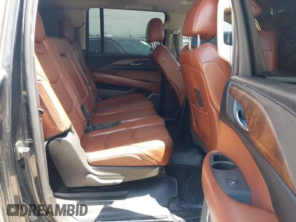 2015 Cadillac Escalade ESV Premium z VIN 1GYS4JKJ1FR290370, wystawiony jako IAAI lot #42798963 z przebiegiem 179 935 mil mil oraz . Historia ofert i sprzedaży dostępna na DreamBid. Obrazek 8.