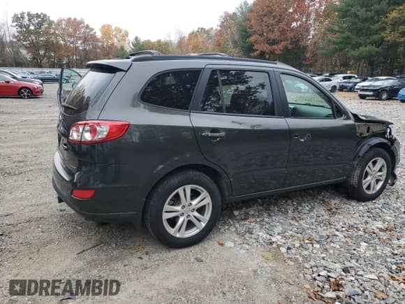 2012 Hyundai Santa Fe Limited с VIN 5XYZKDAG1CG147608, выставлен на аукционе Copart как лот 87013655 с пробегом 122 051 миль миль и Чистый • Clean title. История ставок и продаж доступна на DreamBid. Изображение 3.