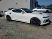 2018 Chevrolet Camaro 1LT с VIN 1G1FB1RX8J0189940, выставлен на аукционе Copart как лот 71609285 с пробегом 94 454 миль миль и Списание • Salvage title. История ставок и продаж доступна на DreamBid. Изображение 4.