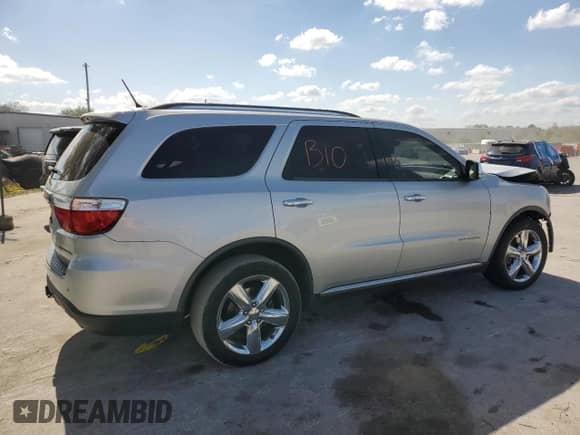2011 Dodge Durango Citadel with VIN 1D4SD5GT1BC692476, listed as a Copart auction lot 49863815 with 187,910 mi miles and Salvage title. Bid and sale history available at DreamBid. Image 3.