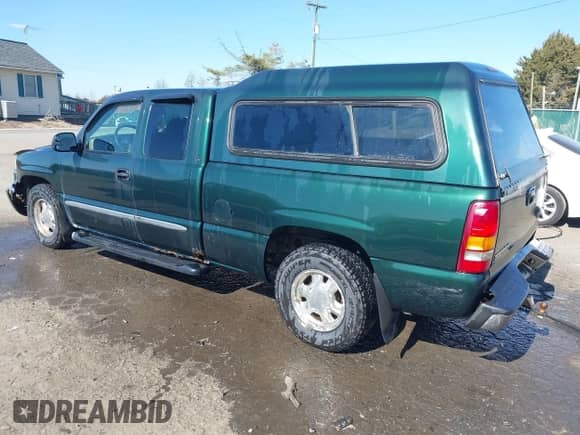 2003 GMC Sierra 1500 SLE with VIN 2GTEC19T631280046, listed as a IAAI auction lot 41677072 with 217,336 mi miles and . Bid and sale history available at DreamBid. Image 3.