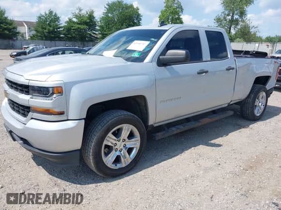 2018 Chevrolet Silverado 1500 Custom with VIN 1GCVKPEH6JZ354772, listed as a IAAI auction lot 42540757 with 82,559 mi miles and . Bid and sale history available at DreamBid. Image 2.
