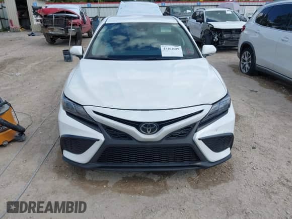2023 Toyota Camry SE with VIN 4T1G11AKXPU755740, listed as a IAAI auction lot 43464689 with 35,445 mi miles and . Bid and sale history available at DreamBid. Image 12.